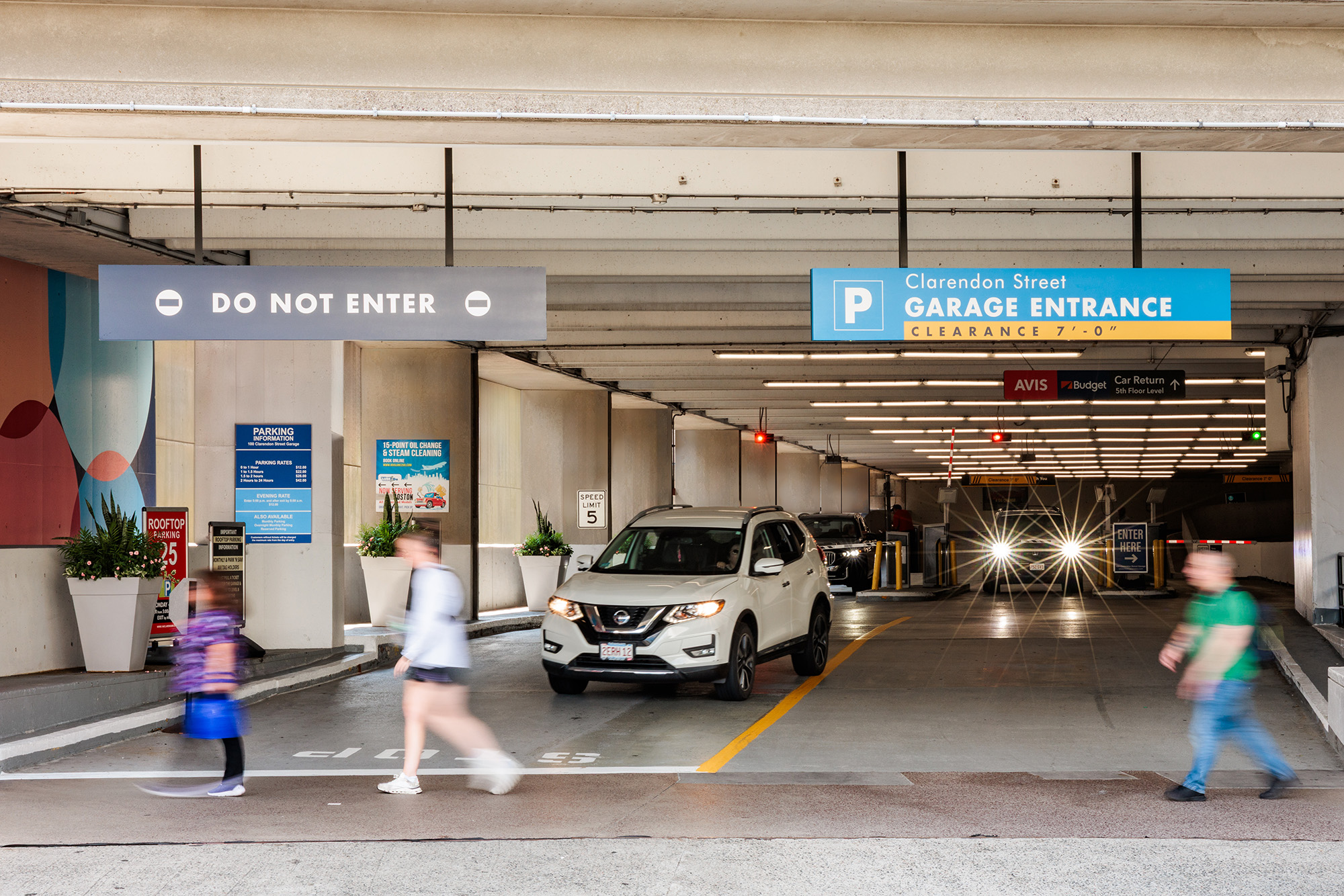 Entrance to 100 Clarendon Street parking garage in Boston Back Bay, showing access for monthly and flexible parking programs