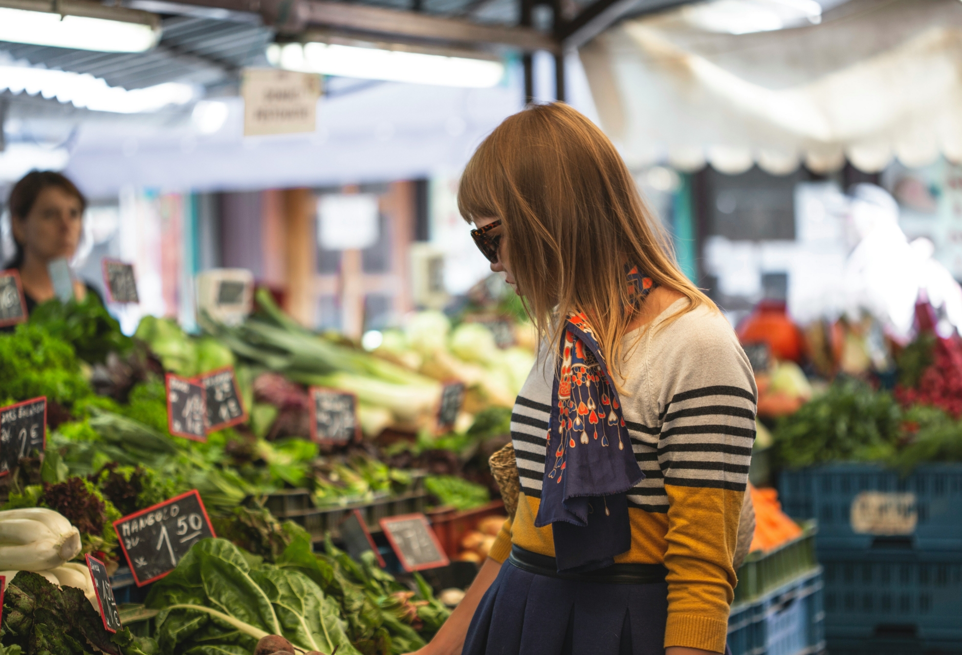Woman shopping at the Copley Square Farmers Market in Boston, near 100 Clarendon Street parking garage